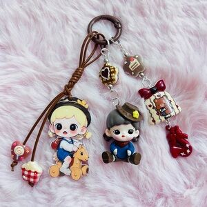 Cute Zorra Sister Keychain Set with Brown and Red Accents